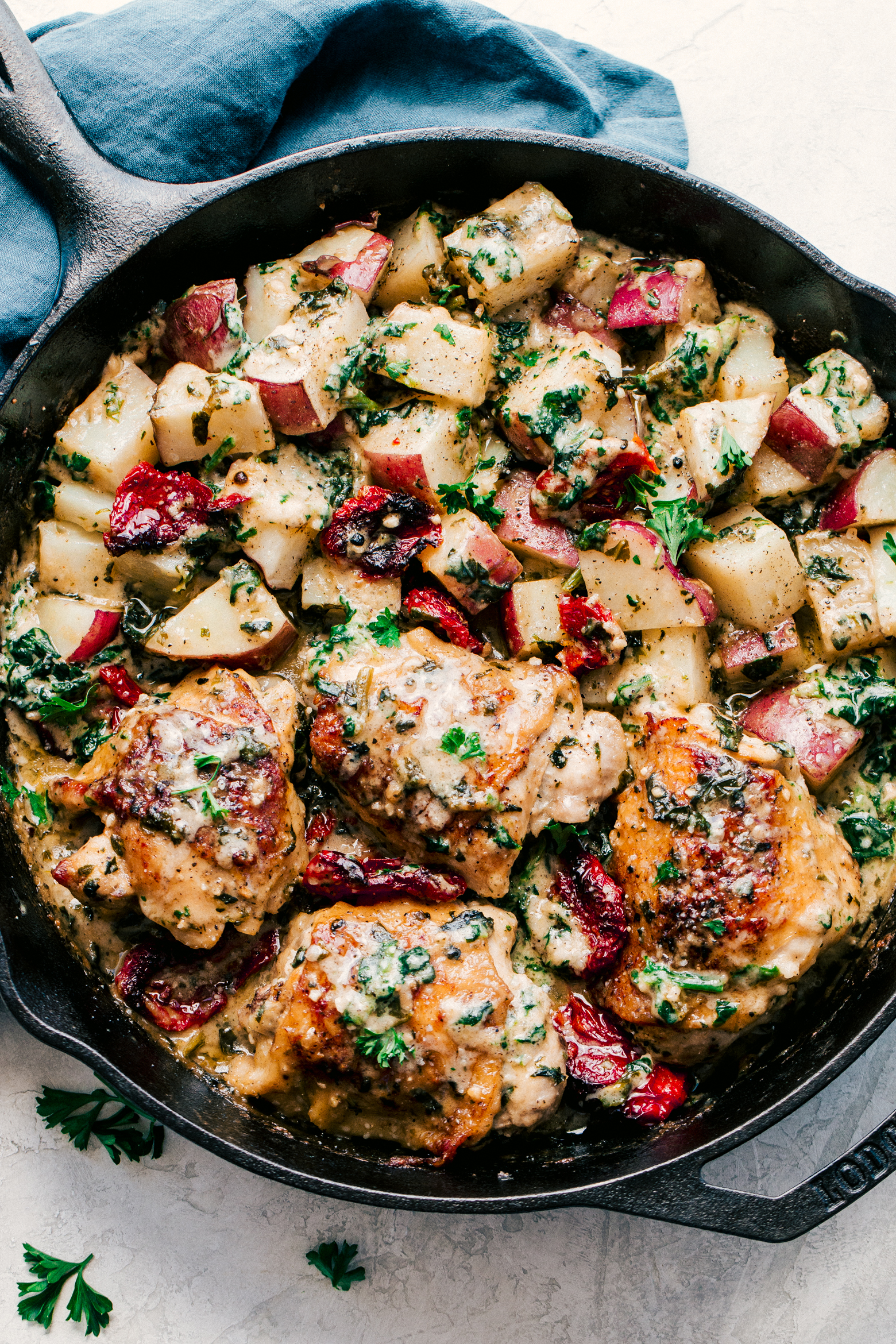 creamy Tuscan Chicken and potatoes in a skillet-perfect weeknight meal. 