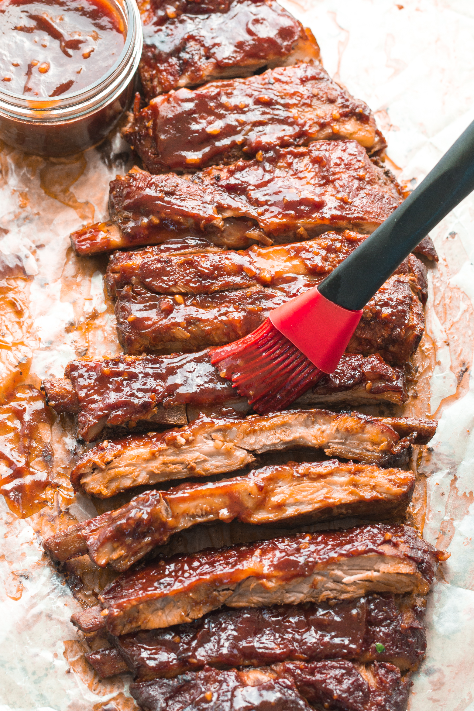 slow cooker ribs cut perfectly and topped with BBQ sauce by the food cafe. 