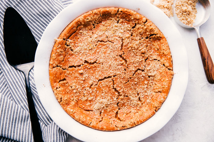 Easy Healthy Crustless Pumpkin Pie Recipe in a white pie plate.